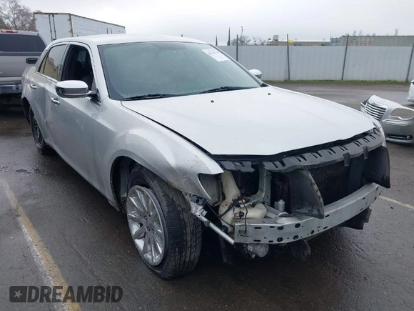 2011 Chrysler 300 Limited with VIN 2C3CA5CG9BH614354, listed as a IAAI auction lot 41216730 with 141,670 mi miles. Bid and sale history available at carsss.com. Image 1.