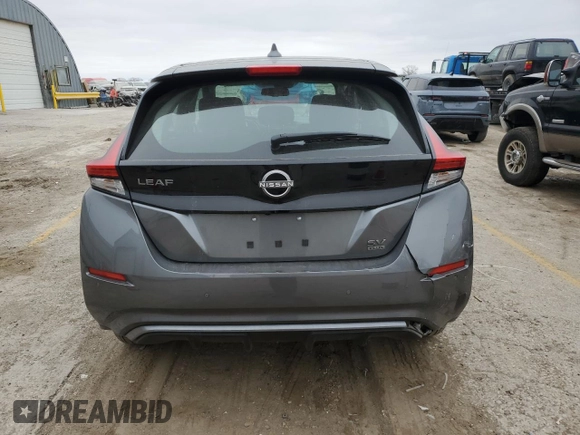 2024 Nissan LEAF SV Plus z VIN 1N4CZ1CV4RC551131, wystawiony jako Copart lot #87374394 z przebiegiem Nie podano mil oraz Szkoda całkowita • Salvage title. Historia ofert i sprzedaży dostępna na DreamBid. Obrazek 6.