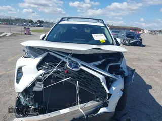 2021 Toyota RAV4 XLE with VIN 2T3W1RFV2MC102997, listed as a IAAI auction lot 41512340 with 47,238 mi miles. Bid and sale history available at carsss.com. Image 6.