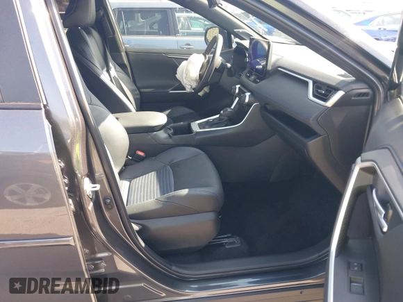 2023 Toyota RAV4 Hybrid XSE with VIN 4T3E6RFV6PU120175, listed as a IAAI auction lot 42499631 with 27,452 mi miles and . Bid and sale history available at DreamBid. Image 5.