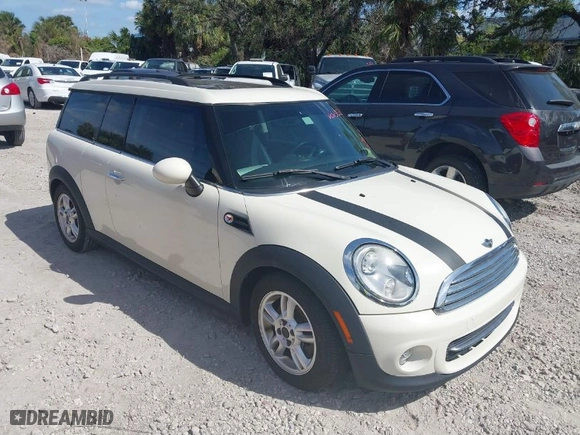 2013 MINI Cooper Clubman with VIN WMWZF3C57DT571338, listed as a IAAI auction lot 41367674 with 77,628 mi miles. Bid and sale history available at carsss.com. Image 1.