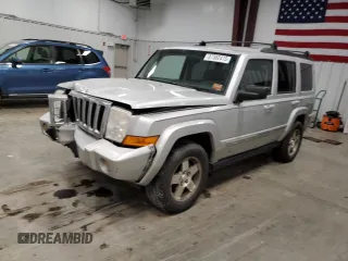 2010 Jeep Commander Sport with VIN 1J4RG4GK2AC127697, listed as a Copart auction lot 87582415 with 204,676 mi miles and Salvage title. Bid and sale history available at DreamBid. Image 1.