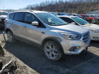2019 Ford Escape Titanium with VIN 1FMCU9J98KUB53669, listed as a Copart auction lot 47344715 with 84,051 mi miles and Salvage title. Bid and sale history available at DreamBid. Image 4.