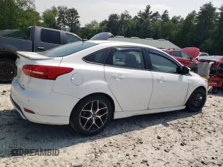 2015 Ford Focus SE with VIN 1FADP3F28FL332899, listed as a Copart auction lot 60055185 with 76,948 mi miles and Clean title. Bid and sale history available at DreamBid. Image 3.