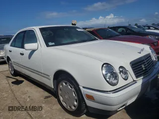 1996 Mercedes-Benz E Class with VIN WDBJF20F1TJ019480, listed as a Copart auction lot 76764114 with 0 mi miles and Salvage Title. Bid and sale history available at carsss.com. Image 4.