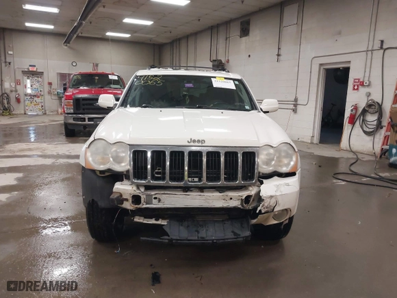 2009 Jeep Grand Cherokee Limited with VIN 1J8GR58K29C553812, listed as a IAAI auction lot 41520065 with 203,595 mi miles. Bid and sale history available at carsss.com. Image 13.