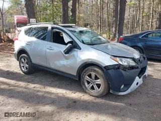 2015 Toyota RAV4 XLE with VIN JTMWFREV5FD066613, listed as a IAAI auction lot 41858067 with 219,328 mi miles. Bid and sale history available at carsss.com. Image 1.