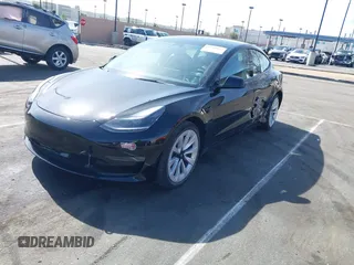 2022 Tesla Model 3 Long Range with VIN 5YJ3E1EB1NF133356, listed as a IAAI auction lot 41568303 with 73,406 mi miles and . Bid and sale history available at DreamBid. Image 18.