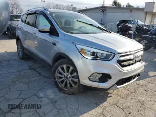 2017 Ford Escape Titanium with VIN 1FMCU9J95HUA48080, listed as a Copart auction lot 83202034 with 122,528 mi miles and Salvage Title. Bid and sale history available at carsss.com. Image 4.