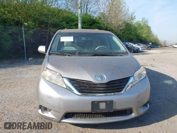 2011 Toyota Sienna LE with VIN 5TDJK3DC9BS012944, listed as a IAAI auction lot 42106998 with 108,700 mi miles. Bid and sale history available at carsss.com. Image 6.