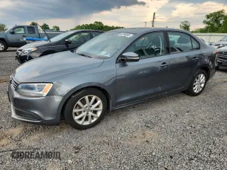 2011 Volkswagen Jetta SE z VIN 3VWDZ7AJ7BM318475, wystawiony jako Copart lot #63148335 z przebiegiem 125 266 mil mil oraz Czysty tytuł • Clean title. Historia ofert i sprzedaży dostępna na DreamBid. Obrazek 1.