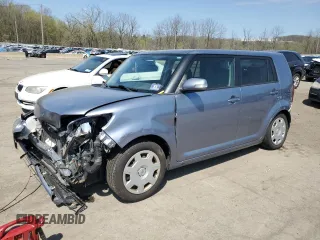 2012 Scion xB with VIN JTLZE4FE7CJ030408, listed as a Copart auction lot 54153195 with 198,649 mi miles and Salvage Title. Bid and sale history available at DreamBid. Image 1.
