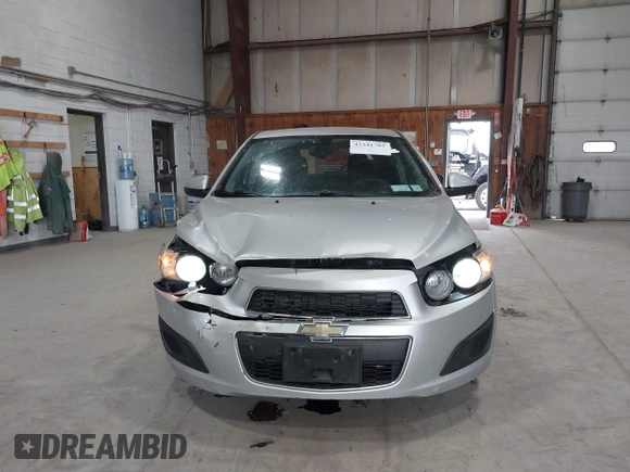 2016 Chevrolet Sonic LT z VIN 1G1JC6SG9G4151259, wystawiony jako IAAI lot #42341705 z przebiegiem 131 981 mil mil oraz . Historia ofert i sprzedaży dostępna na DreamBid. Obrazek 12.