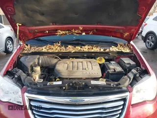 2015 Chrysler Town & Country Touring-L with VIN 2C4RC1CG7FR674321, listed as a IAAI auction lot 41750796 with 165,179 mi miles. Bid and sale history available at carsss.com. Image 10.