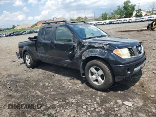 2007 Nissan Frontier SE with VIN 1N6AD09W47C428451, listed as a Copart auction lot 61809095 with 101,969 mi miles and Salvage title. Bid and sale history available at DreamBid. Image 4.