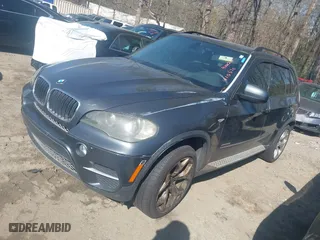 2011 BMW X5 35i with VIN 5UXZV4C58BL410570, listed as a IAAI auction lot 41886238 with 164,192 mi miles. Bid and sale history available at carsss.com. Image 2.