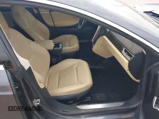 2016 Tesla Model S 90D with VIN 5YJSA1E27GF129130, listed as a IAAI auction lot 41922227 with 134,422 mi miles and . Bid and sale history available at DreamBid. Image 5.