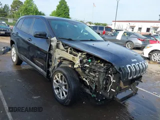 2014 Jeep Cherokee Sport with VIN 1C4PJLAB1EW221415, listed as a IAAI auction lot 42170364 with 182,813 mi miles and . Bid and sale history available at DreamBid. Image 1.