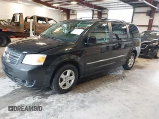 2010 Dodge Grand Caravan SXT with VIN 2D4RN5D19AR433481, listed as a IAAI auction lot 42123049 with 134,882 mi miles and . Bid and sale history available at DreamBid. Image 2.