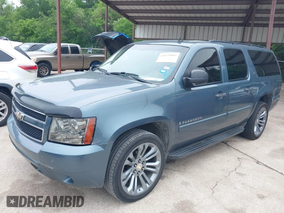 2008 Chevrolet Suburban LS with VIN 1GNFC16008J199742, listed as a IAAI auction lot 42175563 with 288,973 mi miles and . Bid and sale history available at DreamBid. Image 2.