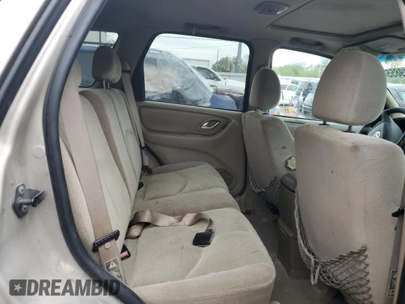 2002 Mazda Tribute LX with VIN 4F2YU09132KM24637, listed as a Copart auction lot 88919855 with 211,198 mi miles and Salvage Title. Bid and sale history available at carsss.com. Image 11.