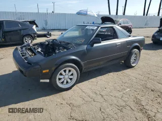 1986 Toyota MR2 z VIN JT2AW15C6G0082489, wystawiony jako Copart lot #53407335 z przebiegiem 335 160 mil mil oraz Tytuł czysty. Historia ofert i sprzedaży dostępna na DreamBid. Obrazek 1.
