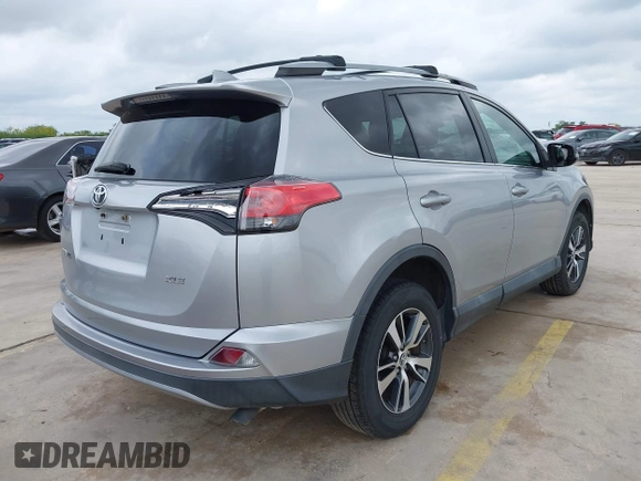 2017 Toyota RAV4 XLE with VIN 2T3WFREV3HW321796, listed as a IAAI auction lot 42080479 with 104,014 mi miles and . Bid and sale history available at DreamBid. Image 4.