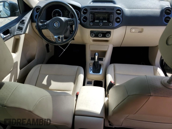 2012 Volkswagen Tiguan SE with VIN WVGAV7AX1CW610349, listed as a Copart auction lot 49250985 with 139,718 mi miles and Salvage Title. Bid and sale history available at DreamBid. Image 8.
