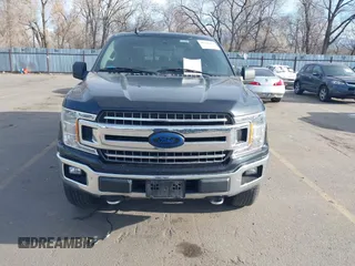 2019 Ford F-150 XL with VIN 1FTEW1E42KFA87194, listed as a IAAI auction lot 41266379 with 89,799 mi miles. Bid and sale history available at carsss.com. Image 1.