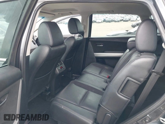 2015 Mazda CX-9 Grand Touring with VIN JM3TB3DV1F0465966, listed as a IAAI auction lot 42049749 with 74,470 mi miles and . Bid and sale history available at DreamBid. Image 8.