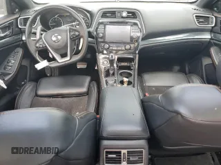 2019 Nissan Maxima SL z VIN 1N4AA6AV4KC374004, wystawiony jako Copart lot #59186745 z przebiegiem 121 571 mil mil oraz Szkoda całkowita • Salvage title. Historia ofert i sprzedaży dostępna na DreamBid. Obrazek 8.