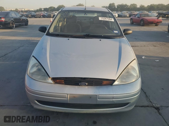 2000 Ford Focus LX with VIN 1FAFP33P6YW376765, listed as a Copart auction lot 75347554 with 189,468 mi miles and Salvage Title. Bid and sale history available at DreamBid. Image 5.