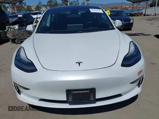 2019 Tesla Model 3 Mid Range with VIN 5YJ3E1EA1KF422983, listed as a IAAI auction lot 41861334 with 53,017 mi miles. Bid and sale history available at carsss.com. Image 12.