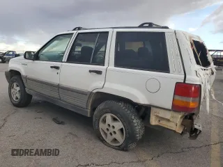 1995 Jeep Grand Cherokee Laredo with VIN 1J4GZ58Y6SC718918, listed as a Copart auction lot 72226394 with 212,670 mi miles and Salvage Title. Bid and sale history available at carsss.com. Image 2.