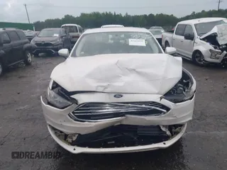 2018 Ford Fusion SE z VIN 3FA6P0H75JR159448, wystawiony jako IAAI lot #42262839 z przebiegiem 144 353 mil mil oraz . Historia ofert i sprzedaży dostępna na DreamBid. Obrazek 12.