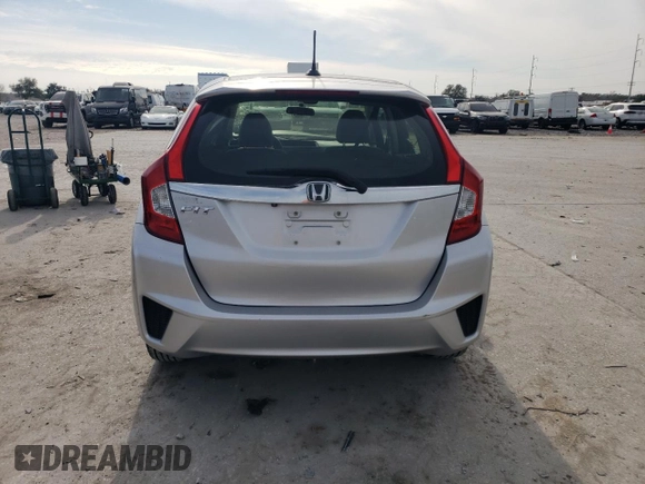 2016 Honda Fit EX-L with VIN JHMGK5H94GS015414, listed as a Copart auction lot 42038725 with 6,728 mi miles and Salvage title. Bid and sale history available at DreamBid. Image 6.