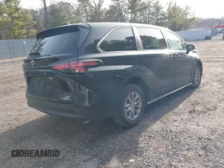 2021 Toyota Sienna LE z VIN 5TDKRKEC9MS043364, wystawiony jako IAAI lot #41515918 z przebiegiem 98 028 mil mil oraz . Historia ofert i sprzedaży dostępna na DreamBid. Obrazek 4.