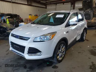 2016 Ford Escape Titanium with VIN 1FMCU9J94GUC28648, listed as a IAAI auction lot 42043761 with 82,509 mi miles and . Bid and sale history available at DreamBid. Image 17.