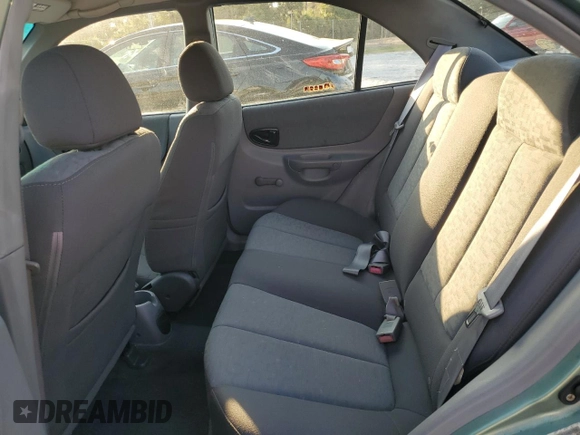 2005 Hyundai Accent GLS with VIN KMHCG45C35U595666, listed as a Copart auction lot 88294365 with 70,497 mi miles and Salvage Title. Bid and sale history available at carsss.com. Image 10.