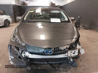 2021 Toyota Prius LE with VIN JTDKAMFP8M3175487, listed as a IAAI auction lot 42176936 with 78,153 mi miles and . Bid and sale history available at DreamBid. Image 12.