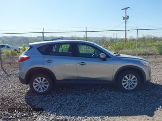 2013 Mazda CX-5 Sport with VIN JM3KE4BE0D0125748, listed as a IAAI auction lot 42143020 with 158,580 mi miles. Bid and sale history available at carsss.com. Image 13.