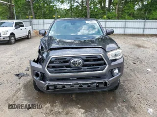 2018 Toyota Tacoma SR5 с VIN 5TFAZ5CN3JX071474, выставлен на аукционе Copart как лот 54677335 с пробегом 86 866 миль миль и Списание • Salvage title. История ставок и продаж доступна на DreamBid. Изображение 5.