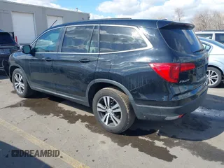 2016 Honda Pilot EX-L with VIN 5FNYF6H53GB048317, listed as a IAAI auction lot 41826297 with 127,672 mi miles. Bid and sale history available at carsss.com. Image 3.
