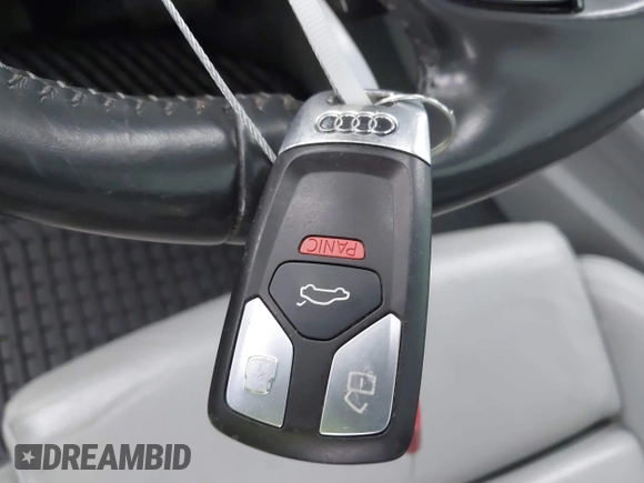 2018 Audi A5 Premium Plus with VIN WAUTNAF56JA049039, listed as a IAAI auction lot 41868983 with 81,551 mi miles and . Bid and sale history available at DreamBid. Image 11.