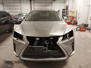 2018 Lexus RX 350L Premium z VIN JTJDZKCA6J2004385, wystawiony jako IAAI lot #41382429 z przebiegiem 111 638 mil mil oraz . Historia ofert i sprzedaży dostępna na DreamBid. Obrazek 13.
