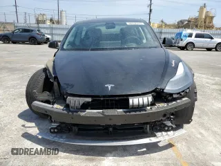 2023 Tesla Model 3 z VIN 5YJ3E1EA7PF549051, wystawiony jako Copart lot #58932765 z przebiegiem 8 800 mil mil oraz Szkoda całkowita • Salvage title. Historia ofert i sprzedaży dostępna na DreamBid. Obrazek 5.