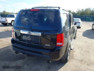 2011 Honda Pilot EX with VIN 5FNYF4H42BB074895, listed as a IAAI auction lot 41215003 with 131,507 mi miles. Bid and sale history available at carsss.com. Image 4.