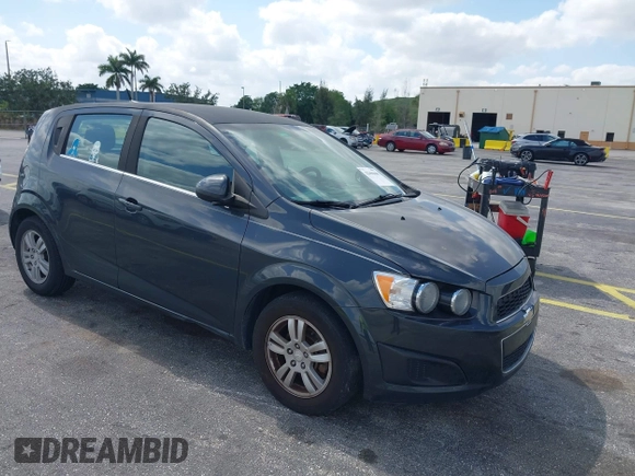 2014 Chevrolet Sonic LT with VIN 1G1JC6SB2E4115463, listed as a IAAI auction lot 42106600 with 135,652 mi miles. Bid and sale history available at carsss.com. Image 1.