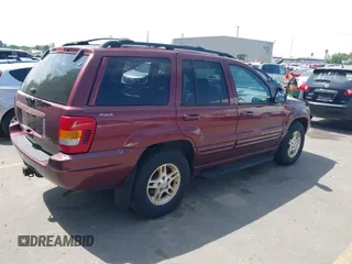 1999 Jeep Grand Cherokee Limited with VIN 1J4GW68S9XC653855, listed as a IAAI auction lot 42433370 with 275,724 mi miles and . Bid and sale history available at DreamBid. Image 4.
