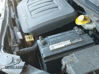 2014 Dodge Grand Caravan SE 30th Anniversary z VIN 2C4RDGBG4ER401630, wystawiony jako IAAI lot #42785037 z przebiegiem 125 798 mil mil oraz . Historia ofert i sprzedaży dostępna na DreamBid. Obrazek 12.